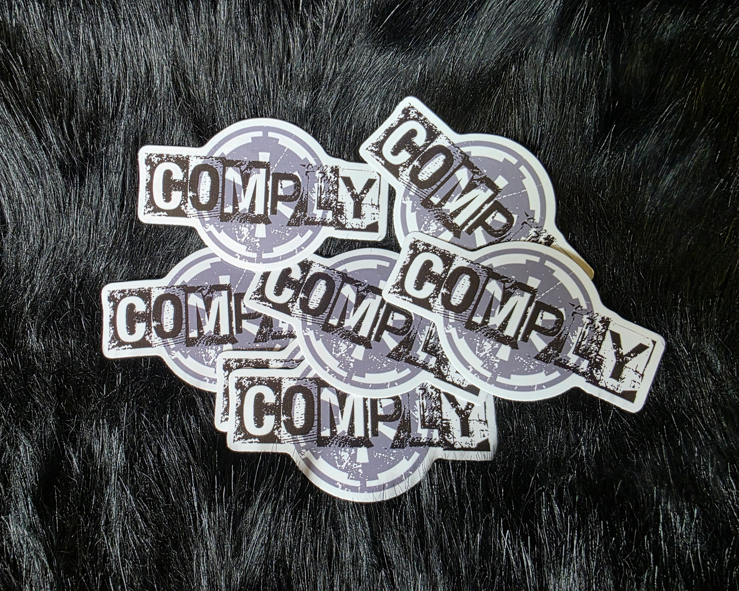 Comply Sticker